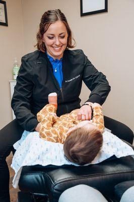 Dr.Ruddle Adjusting a pediatric patient