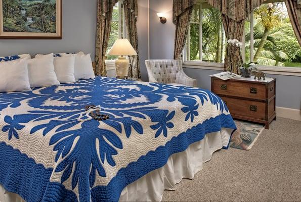 Elegant Eucalyptus Floors and the original elliptical shower stall are the special features of the soft blue Bird of Paradise Room