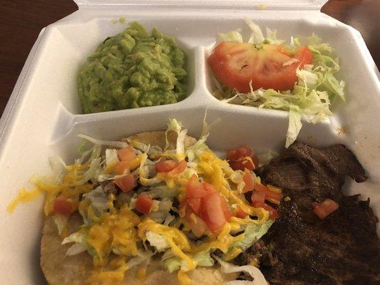 #17 puffy ground beef taco, carne asada, guacamole & small salad