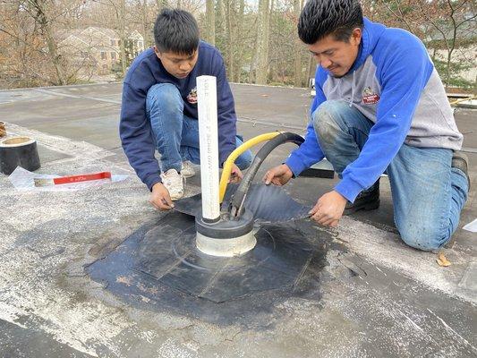 EPDM flat roof leak repair project