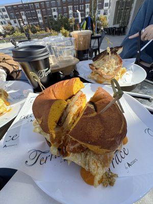 Maple sausage, egg, and cheese on French toast bagel.