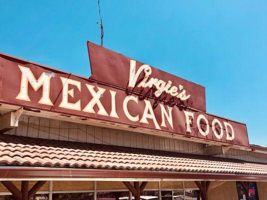 The sign in front of the restaurant