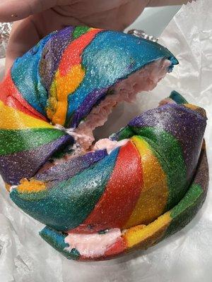 Rainbow bagel toasted with strawberry cream cheese. Pretty good!