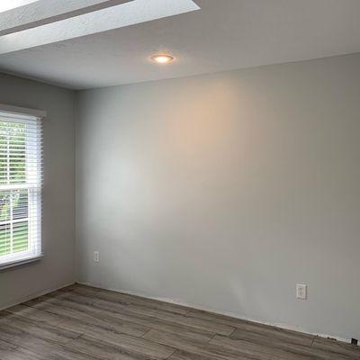 Laminate Floor Install, Wall Repair, Painting