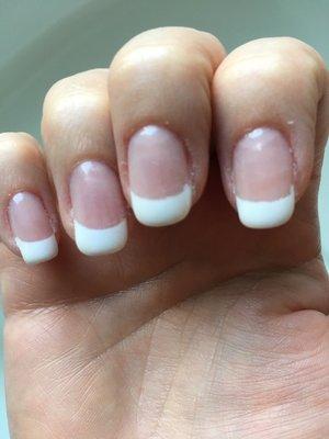 This was my $40 shellac manicure after being in the salon for 90 minutes. Cuticles look awful, polish isn't clean. Looks fuzzy.