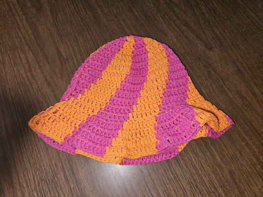 Pink and orange crocheted sun hat.