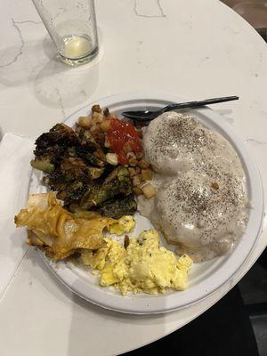 Buffet style breakfast with biscuits and gravy, Brussels sprouts and so many sides!