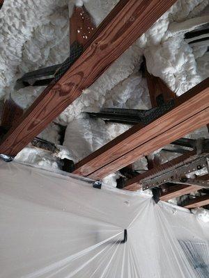 Here is a view of the spray foam between the joists for maximum results.