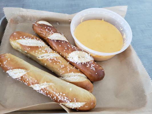 Beer cheese with soft pretzel sticks