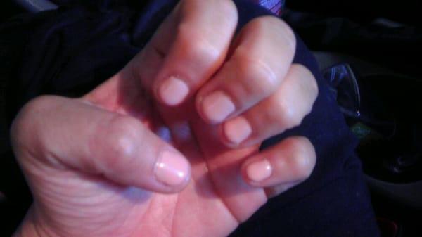 The cuticles are jagged & polish is sloppily brushed on