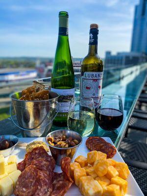 On Wednesdays, Top of the Park offers wine specials and a petit charcuterie option for two.  $3 off glasses of wine | $10 off bottles | $20