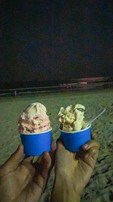 Two double scoop cups of ice cream