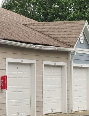 Broken roof over garage