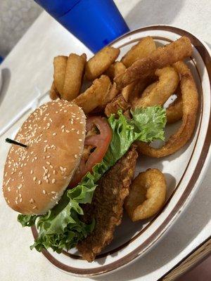 Pork tenderloin sandwich with onion rings