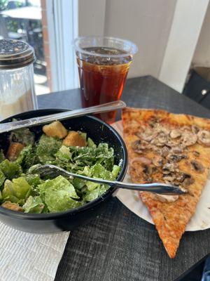 Half Caesar salad and a slice. I added mushrooms. Fresh seasonings on table.