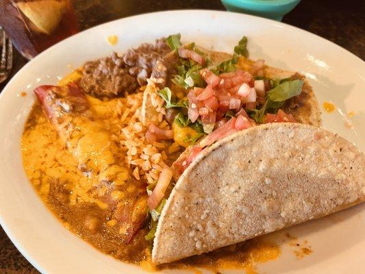 Mexican plate: enchilada, taco and chalupa