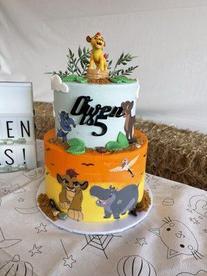 2 tier custom Lion Guard strawberry delight cake