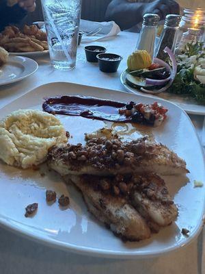 This is supposed to be pecan crusted sea bass. This was a subpar piece of fish with candied pecans thrown on top at a cost of $50.