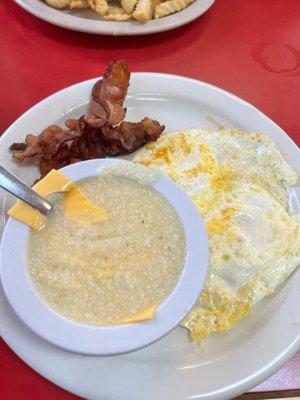 2 eggs, 2 bacon and side of grits with cheese