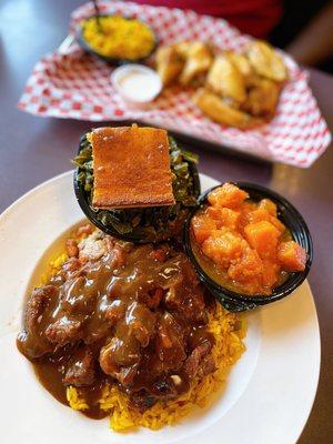 Oxtails with Yellow Rice Collard Greens and Candied Yams