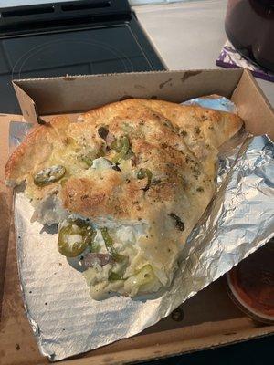 custom calzone that I requested to be lightly cooked. i love that it's always loaded with ricotta.