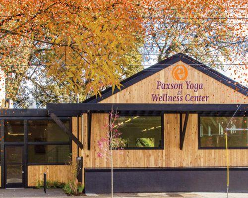 Paxson Yoga & Wellness Center building in Portland Oregon on South Macadam Avenue.  We offer yoga classes and training, massage, pilates +