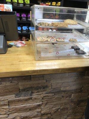 Order counter with sad looking cookies