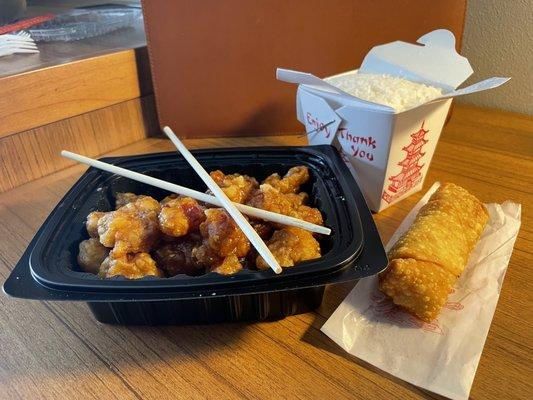 General Tso's Chicken, white rice, and an egg roll.