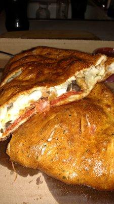 I love the Stromboli.  Dough is brushed with a delicious garlic butter.  Tons of Mozzarella cheese and fillings of your choice.