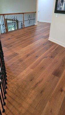 Wood flooring with curved edges.