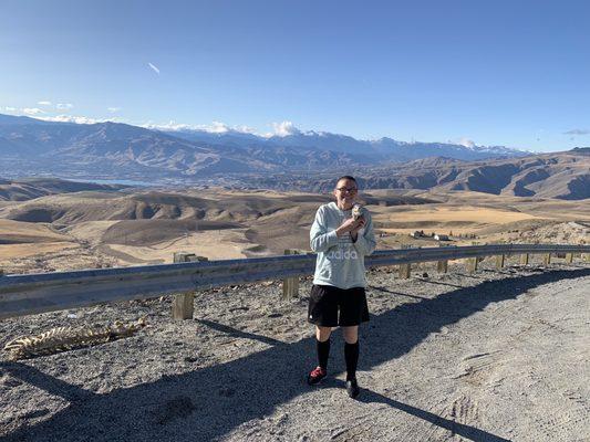 Hedgy the Hedgehog and I at a pull off overlooking Wenatchee Valley.