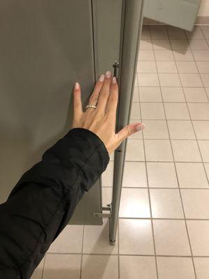 THREE FINGER-WIDTH wide gap in the Ladies bathroom stalls, how is this acceptable?!?!