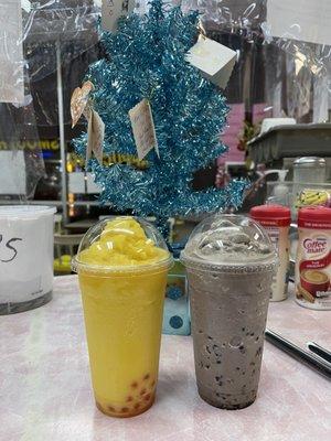 Passion fruit and cookies and cream smoothie with strawberry boba and coffee jellies from Sandy donuts !