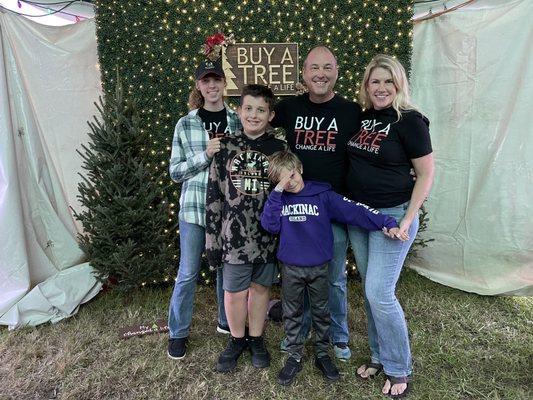 Our family loves getting in the Christmas spirit by serving in the annual tree tent!