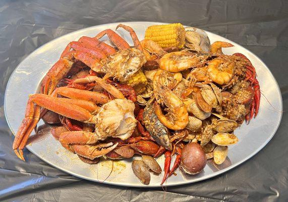 P2. 3 LB Seafood Plate - Shrimp/Clams/Mussel with Bubba Sauce and  P3. Snow Crab Plate: Snow Crab and 1LB Crawfish with Cajun sauce