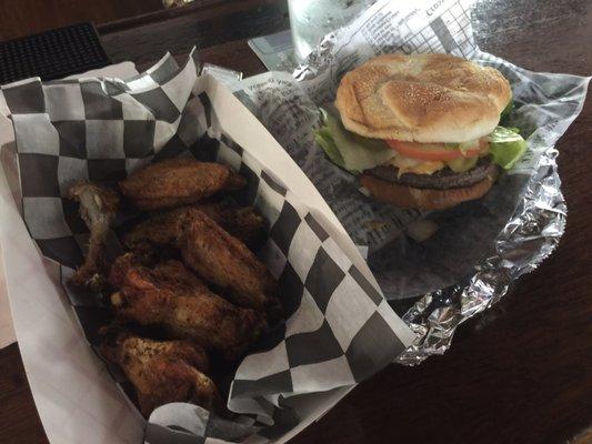 Lemon pepper wings and a juicy bacon cheese burger.