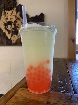 Blended lemonade with strawberry popping boba!