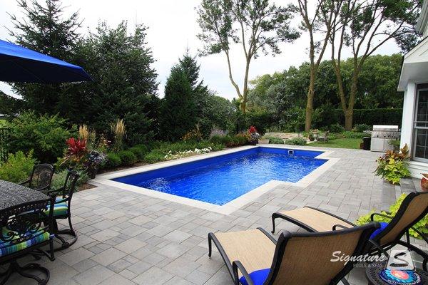 Signature Pool in Libertyville, IL.  This Signature Fiberglass Pool is 33' x 14' 6" and is called the Elegance 33.