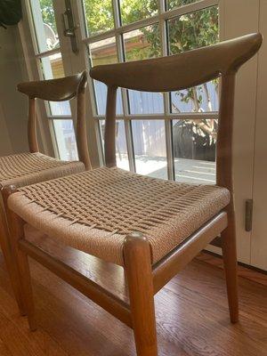 Beautiful Danish cord work and wood refinish on these mid century modern dining chairs.