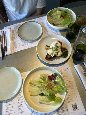 Split Caesar Salad and the baratta with basil pesto.