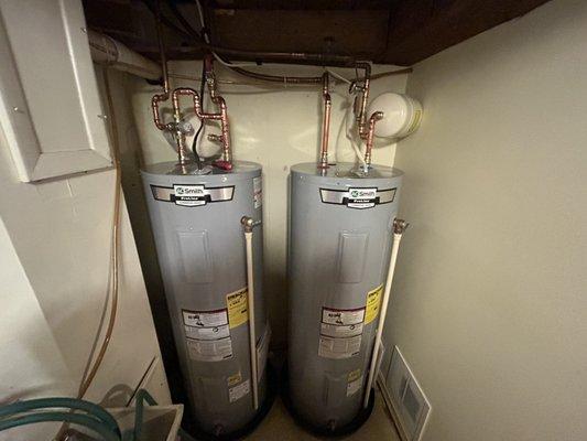 Two water heaters being installed on the same day they called!