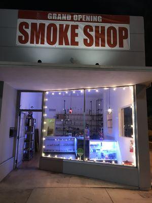 The shop at night.