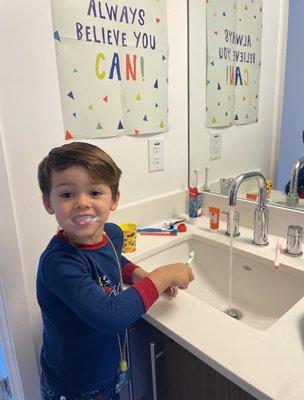 Little Stars Dentistry kids brushing his teeth at home.