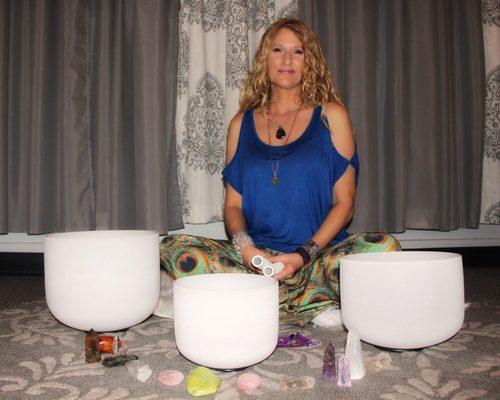 Candy preparing for a Crystal Sound Bath event.