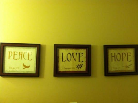 Nice frames in the bathroom.