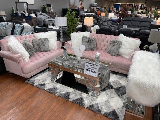 This is a beautiful pink velvet sofa & loveseat