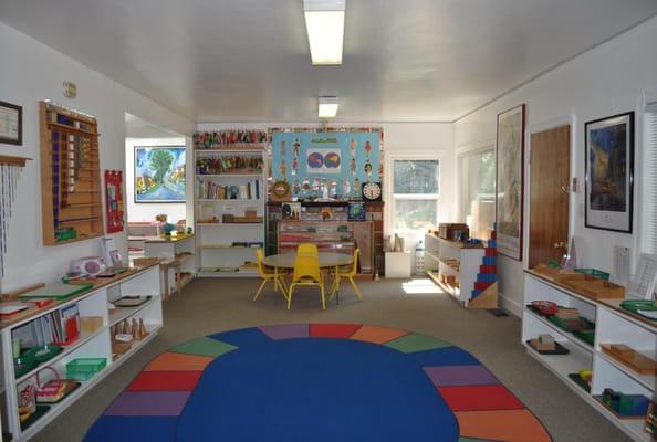 Our Montessori preschool classroom is open and inviting with a full complement of cognitively stimulating activities.