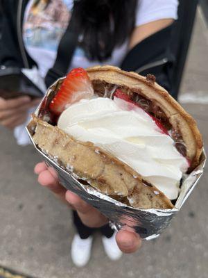 Cinnamon waffle with vanilla ice cream, strawberries and Nutella