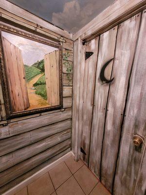 Cute outhouse painted bathroom