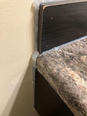 My blind dog could do a better caulking job...